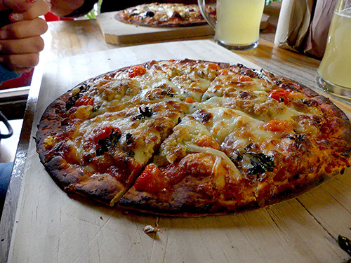 And after the drinks? Hunger, yes. Let's have a Pizza and a pint. And the rustic atmosphere makes the visit perfect. Wood fired Pizza