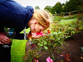 Bianca sniffing roses