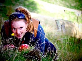 Bianca is hiding behind a fly agaric